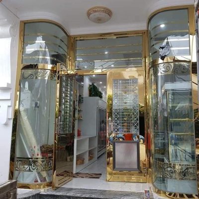 Cửa INOX mạ vàng Shop thời trang